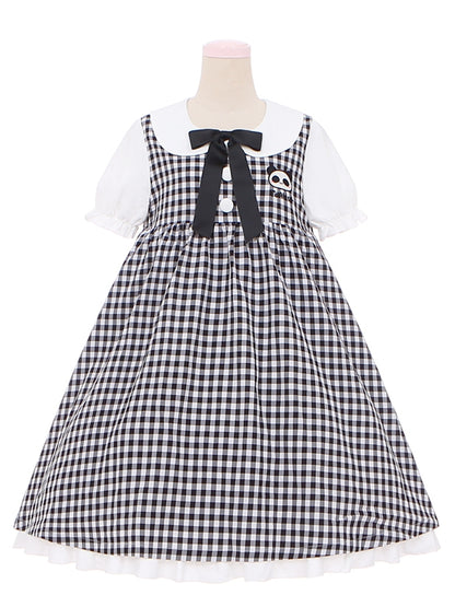 Robe à carreaux noire et blanche à col Peter Pan et manches courtes bouffantes