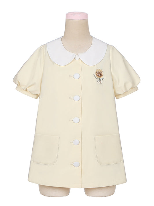 Haut jaune clair à manches bouffantes et col Peter Pan