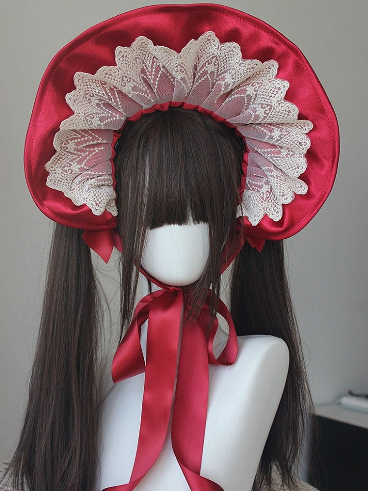 Bonnet à bordure en dentelle et nœud décoratif orné de perles