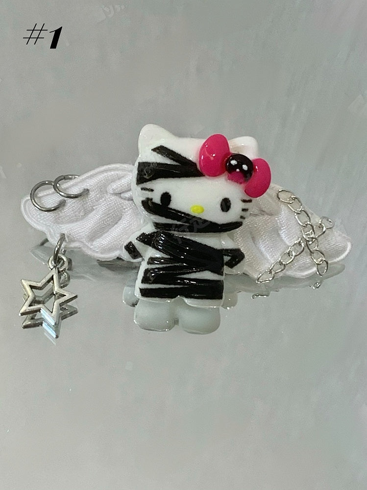 Pinces à cheveux Guro Kawaii Mummy Kitty noires/blanches