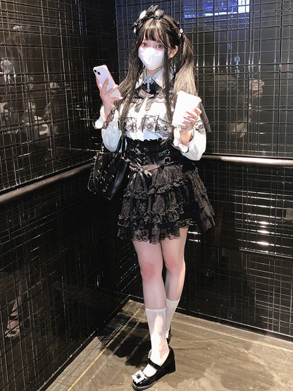 Jupe à volants en dentelle taille haute style mine terrestre avec boucles en forme de cœur bleu Jirai Kei