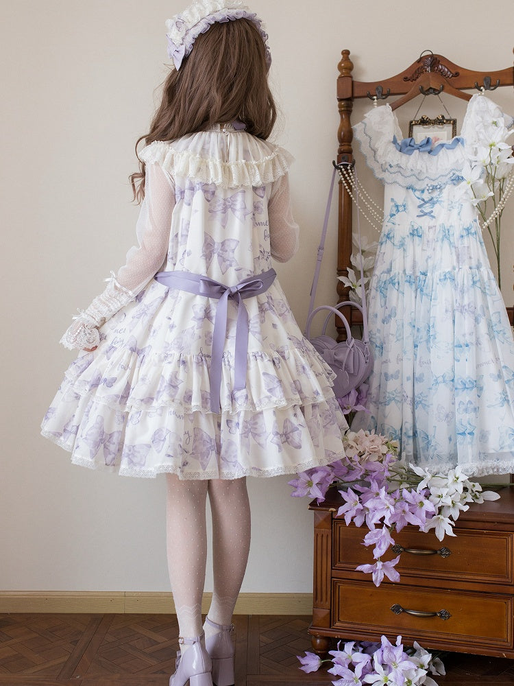 Robe Lolita violette à gros nœud sur le décolleté et imprimé nœuds double épaisseur