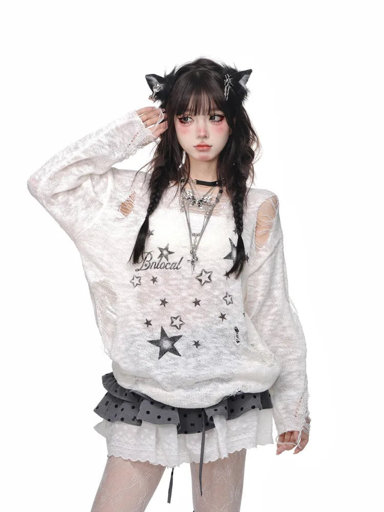 蝶結びの水玉模様のグレーのレースアップスカートのパターンと白いティアードディテール