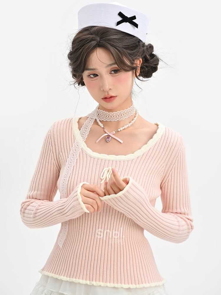 Haut en maille slim à col rond et détails nœud rose