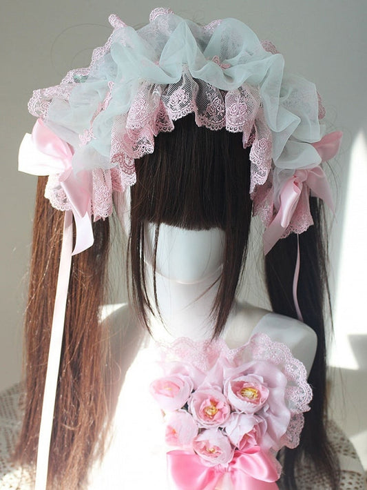 Bandeau à cheveux avec nœud papillon vert et rose et bordure en dentelle