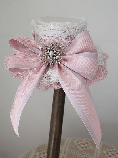 Chapeau haut-de-forme rose de Noël avec nœud en dentelle et voile