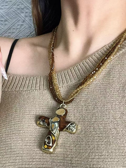 Gold/Brown Cross Pendant Triple Layered Beaded Necklace