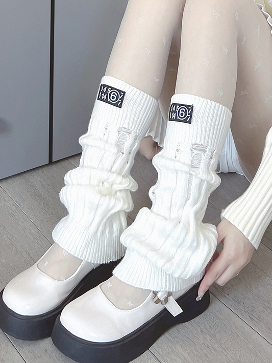 Jambières tricotées blanc cassé/noir