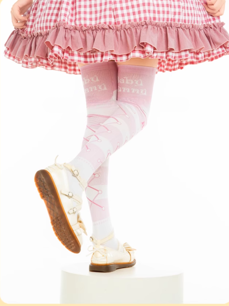 Bas au-dessus du genou à bandes entrecroisées et motif lapin rose