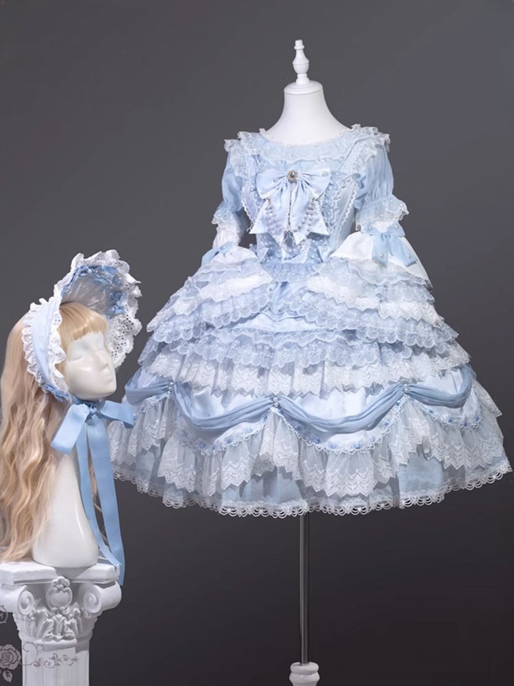 Hellblaue Chiffonbluse mit kurzen Puffärmeln