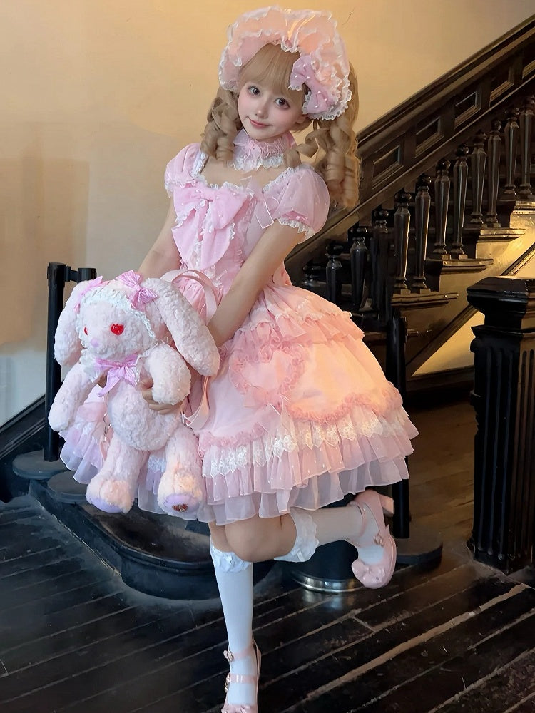Robe Lolita rose à gros nœud et manches bouffantes style princesse