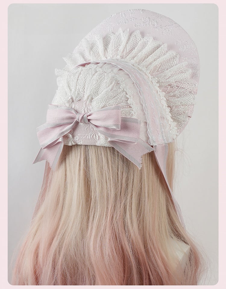 Bonnet Lolita rose à gros nœud et bordure en dentelle florale à volants