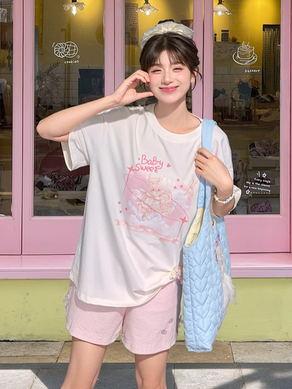 Weißes, lockeres, süßes T-Shirt mit rosa Hasen-Print und Rundhalsausschnitt