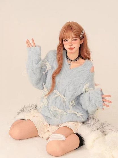Blue V-Neck Sweater with Cutout White Bow Accents Shoulder