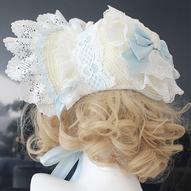 Rosa/blaue Haube mit floralen Schleifendetails und Spitzenbesatz
