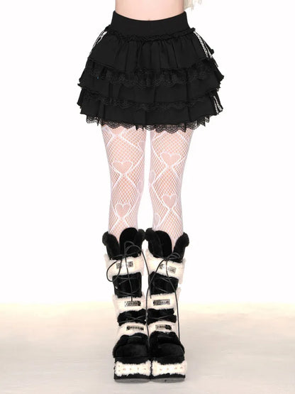 Rock mit Stufen, schwarz/weißer Spitzenbesatz