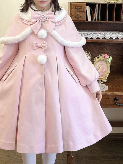 Manteau long à col en peluche rose avec nœud et cape amovible