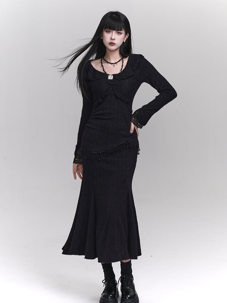 Robe sirène noire ajustée à col rond et détails en perles