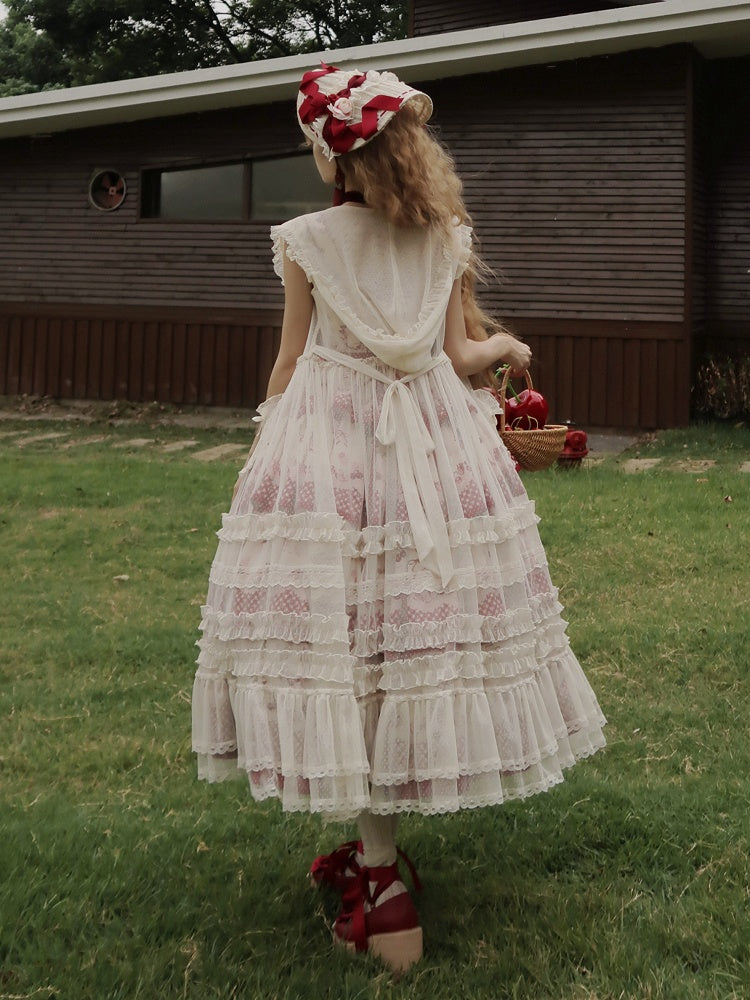 Robe à capuche blanche avec patte de boutonnage sur le devant