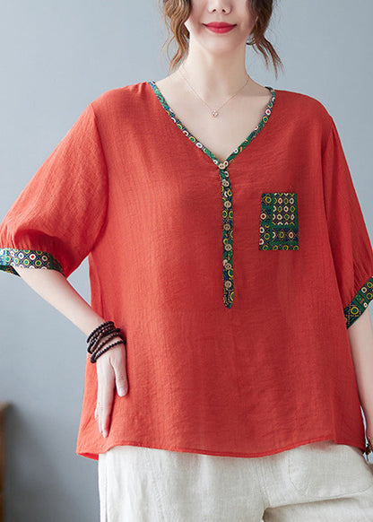 Oberteil mit feinen Printärmeln in Lila mit halbem Patchwork