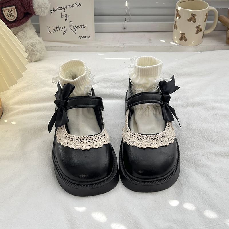 Mary Trim Jane Schuhe mit Schleife, Spitze und Plateau