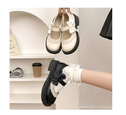 Mary Trim Jane Schuhe mit Schleife, Spitze und Plateau