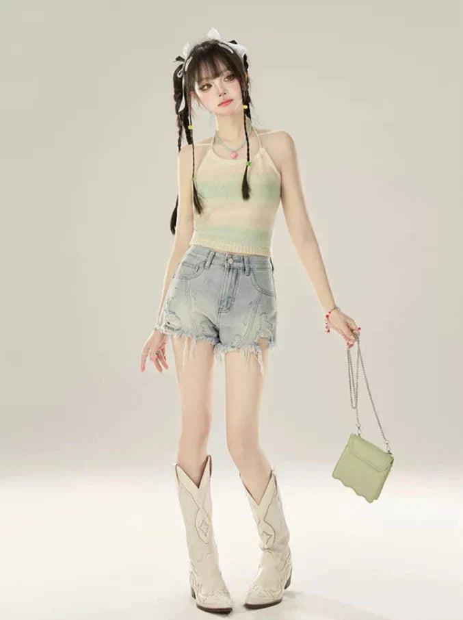 Short en jean taille basse à franges abîmées