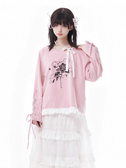 Ensemble haut en dentelle blanc et jupe fleurie rose