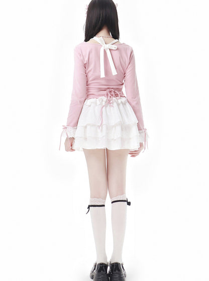 Ensemble haut en dentelle blanc et jupe fleurie rose