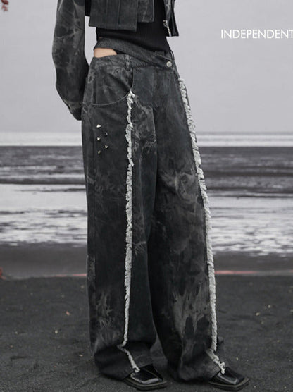 Jean ample à franges et taille large découpée en denim foncé