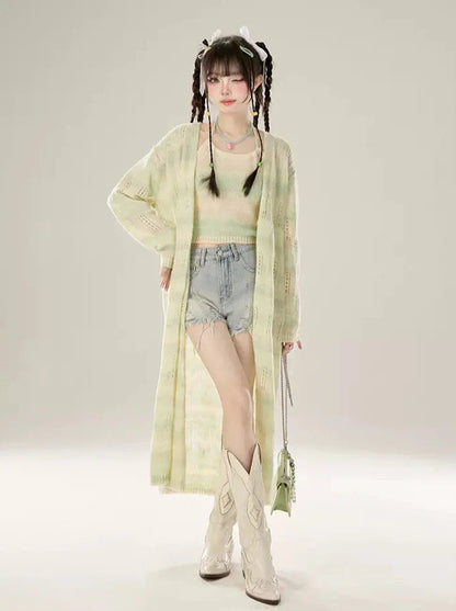 Short en jean taille basse à franges abîmées