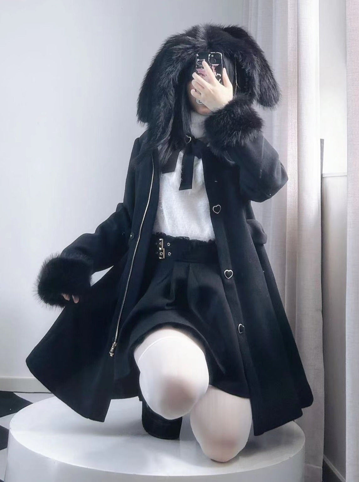 Manteau en fourrure noire pour petit lapin