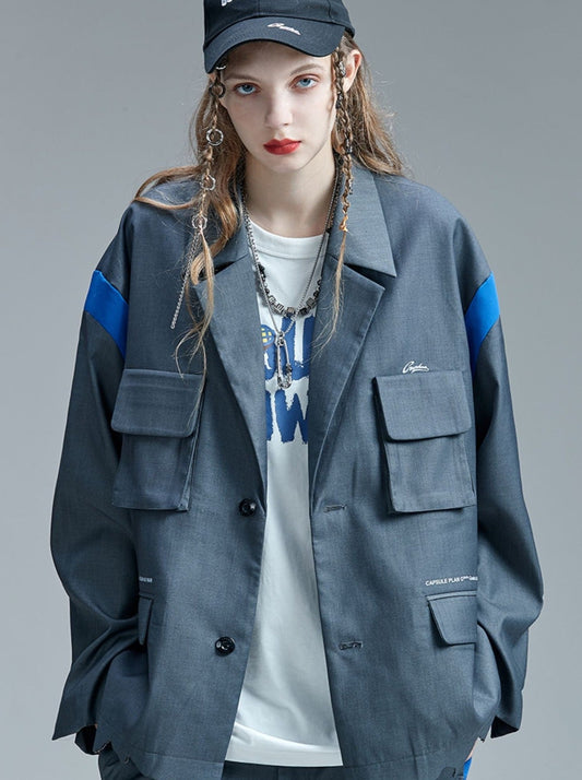 Graue, lockere Arbeitsjacke mit mehreren Taschen