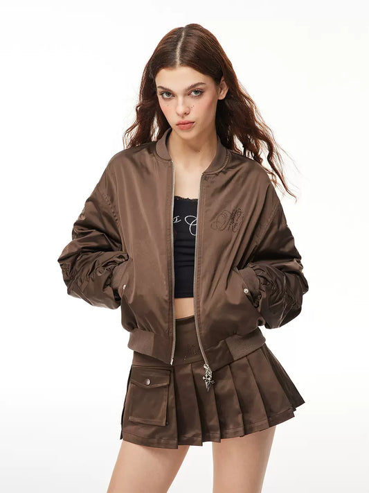 Veste avec logo et jupe à poches froncées + jupe plissée