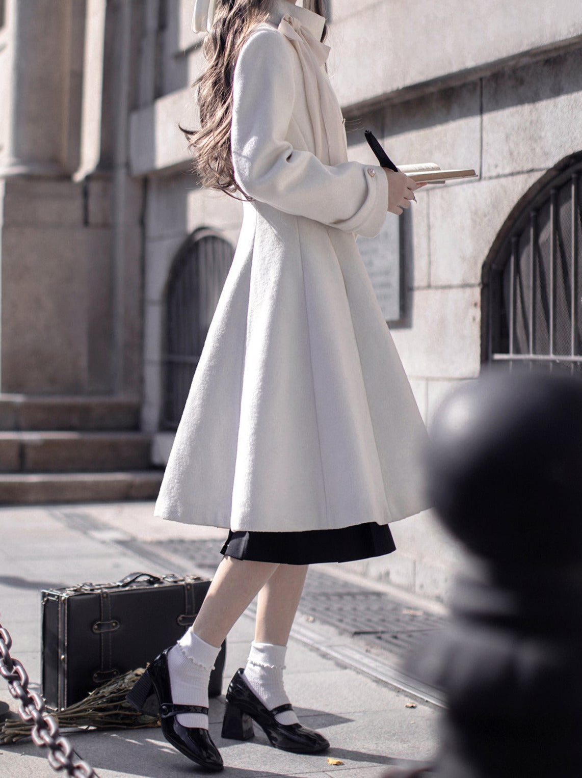 Manteau rétro élégant à double ruban et col boutonné en laine