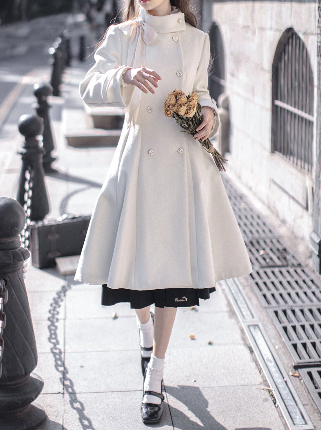 Manteau rétro élégant à double ruban et col boutonné en laine