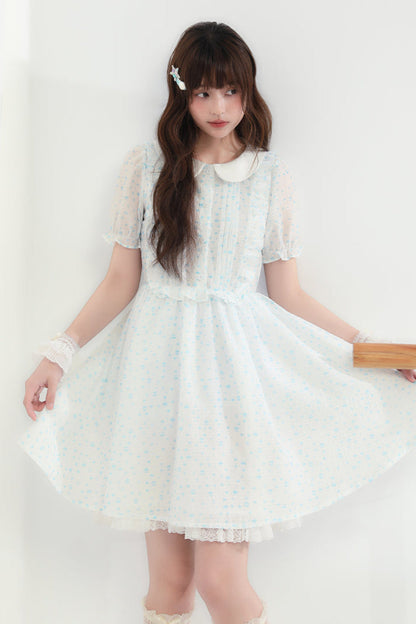 Puppe Ecosta Blumenkleid transparent