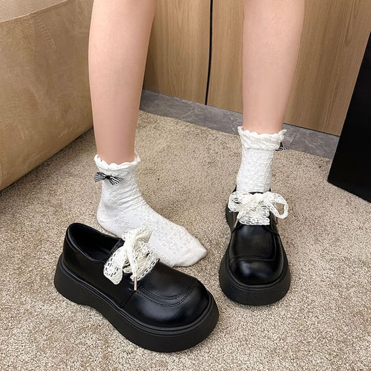 Plateauschuhe mit Schnürung und Einsätzen