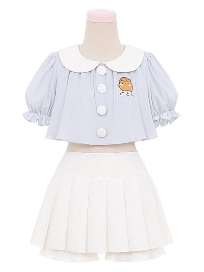 Ensemble haut col Claudine brodé bleu et jupe plissée blanche