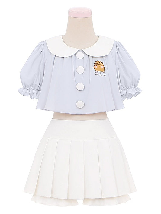 Ensemble haut col Claudine brodé bleu et jupe plissée blanche