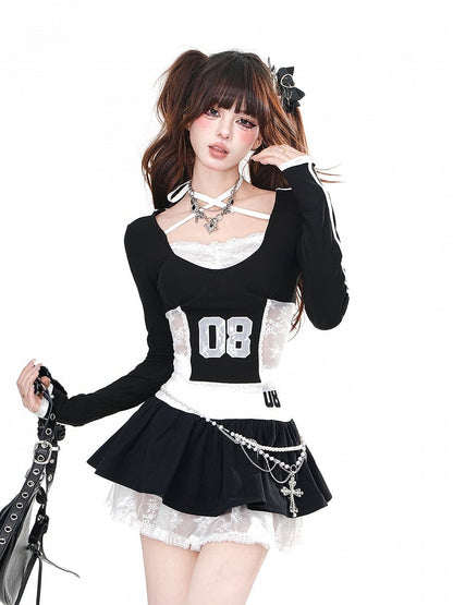 Schwarzes Neckholder-Crop-Top mit kontrastierenden Spitzenpatches