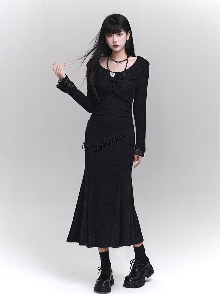 Robe sirène noire ajustée à col rond et détails en perles