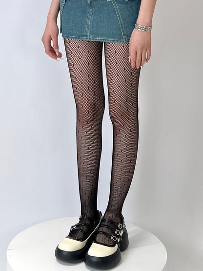 Strumpfhose mit schwarz-weißem Punktmuster