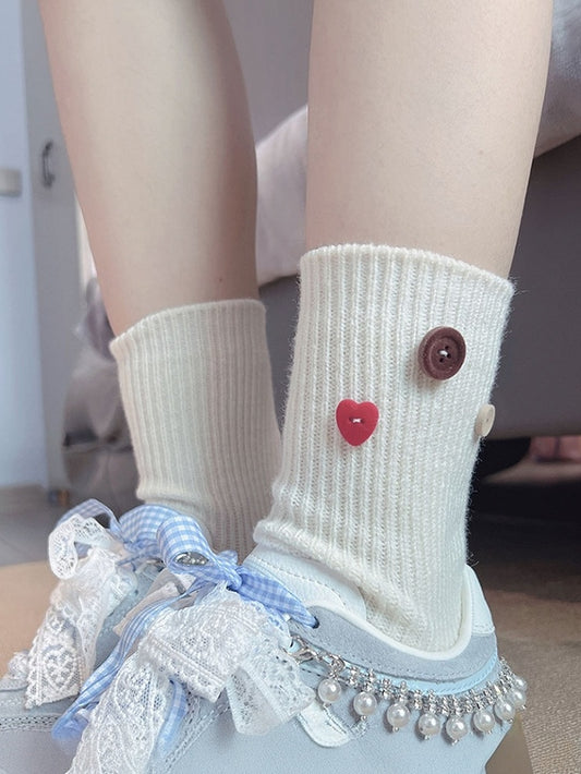Chaussettes mollet décorées de boutons blancs laiteux