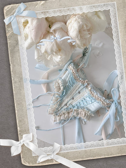 Blauer Korsettgürtel mit Schnürdetails