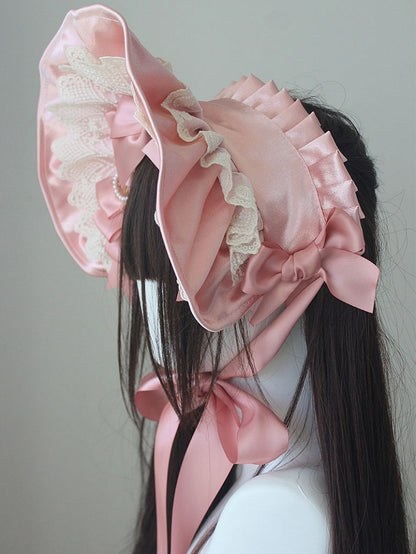 Bonnet à bordure en dentelle et nœud décoratif orné de perles