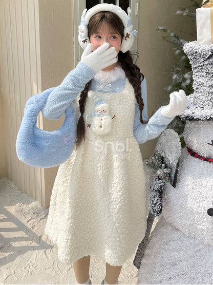 Haut à manches longues et col en peluche bleu avec détails nœud