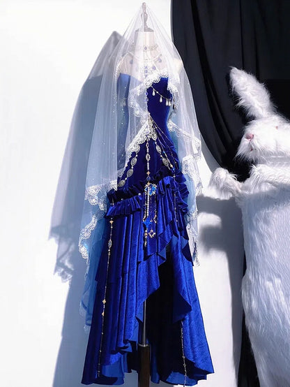 Robe de soirée sirène dos nu en velours bleu marine