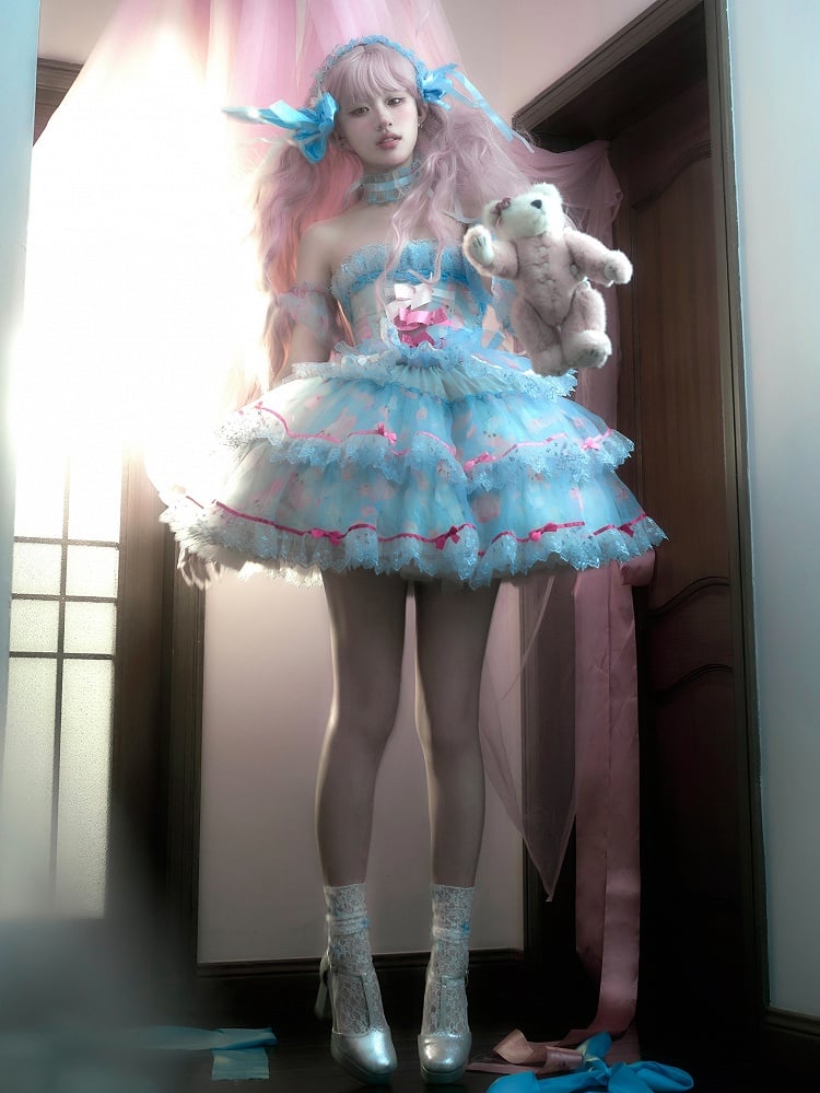 Robe bleue à armatures avec jupe à volants décorée de nœuds en satin et de lapin mignon