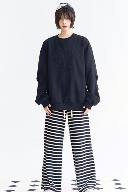 Sweatshirt mit Rundhalsausschnitt und Applikation